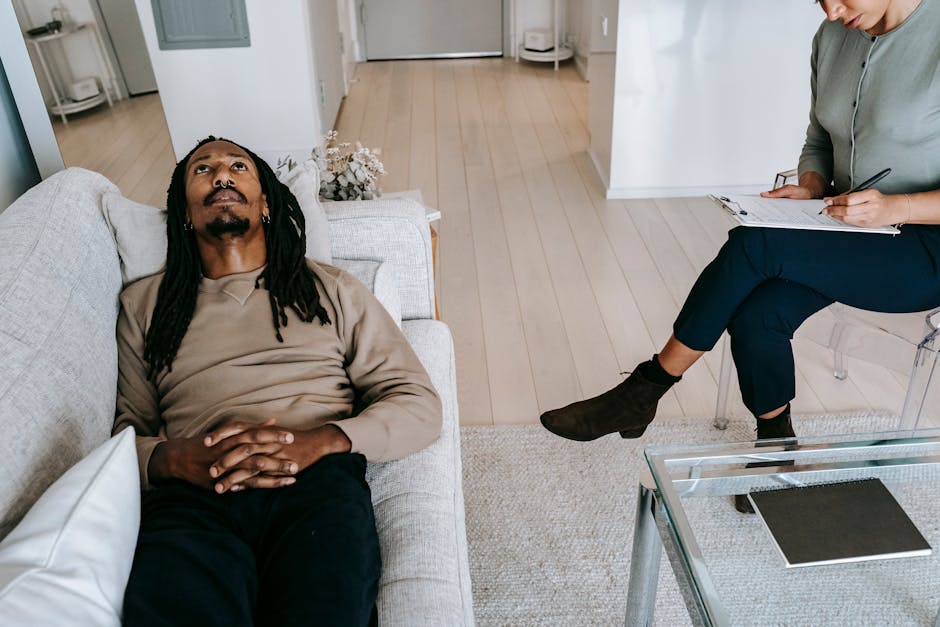 African American man in a one-on-one substance abuse counseling session